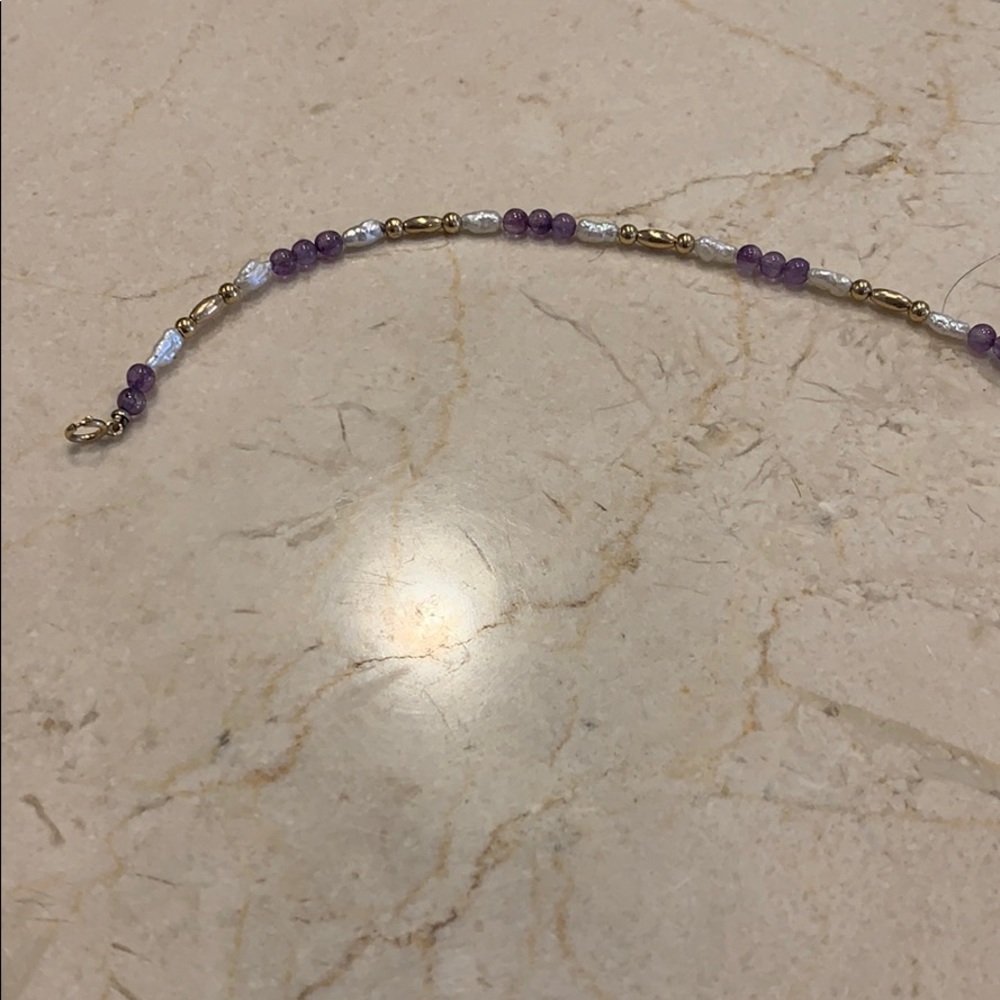Beaded bracelet with gold accent